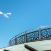 Curved Stainless Steel Laser Cut Railing With Blue Sky Background